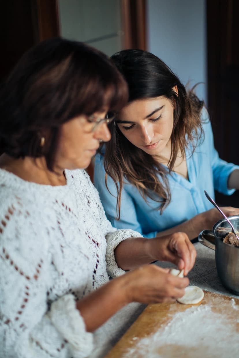 Two women cooking together